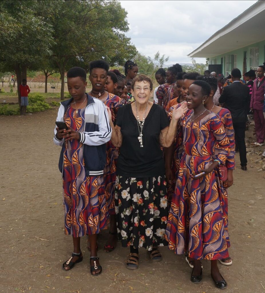 Kathy with the Rescue Center Girl's ready to walk to Graduation